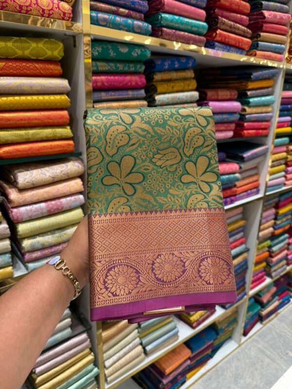 Emerald Green Kanjivaram Silk Saree with Purple Zari Border