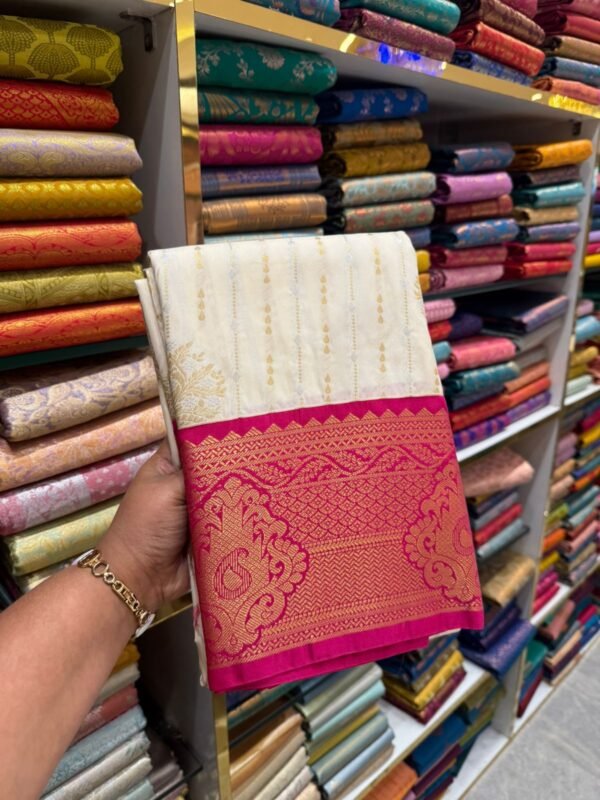 Ivory Kanjivaram Silk Saree with Rich Pink Zari Border