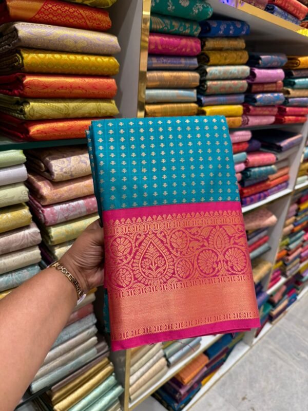 Teal Green Kanjivaram Silk Saree with Pink Zari Border